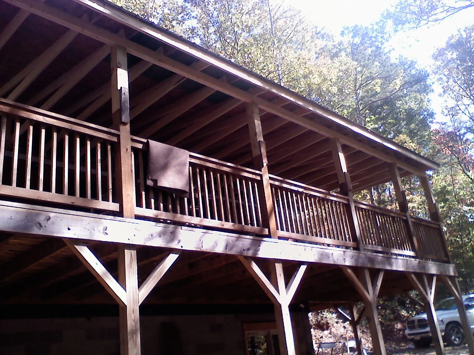 Timber framing under a new elevated porch and deck — Roof Leak Repair in Greensburg by Roofing Brothers